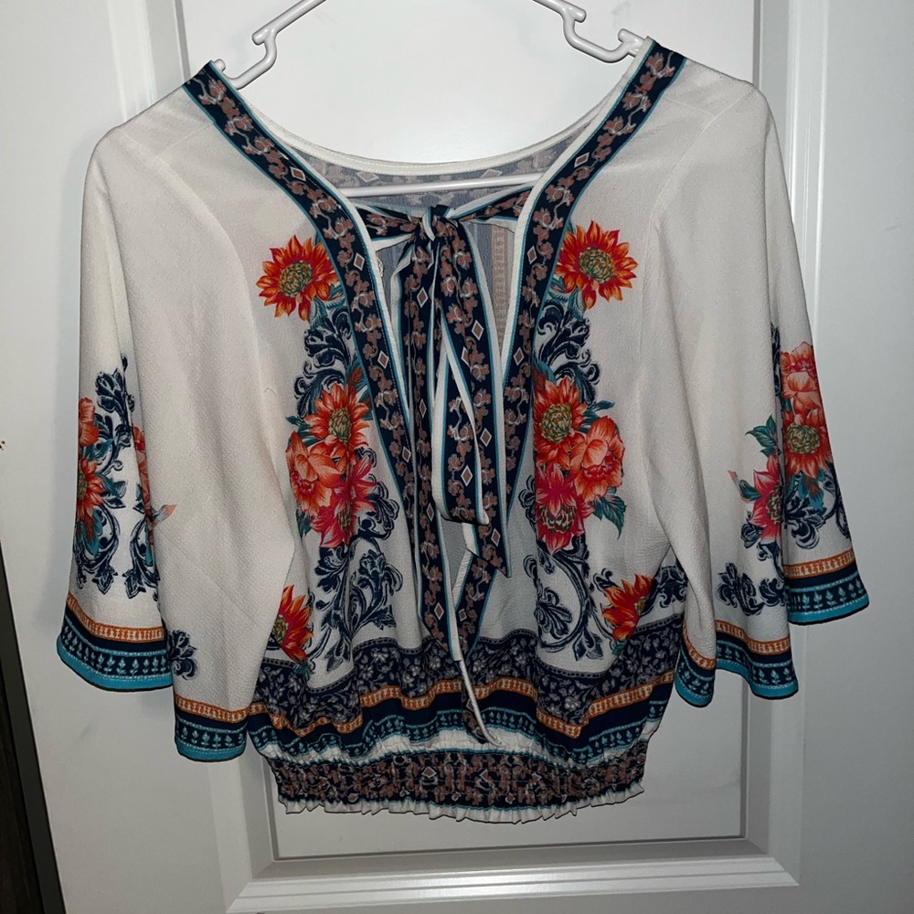A white short sleeve cropped summer shirt